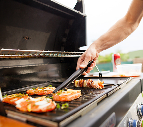 Hosting an outdoor barbeque with friends